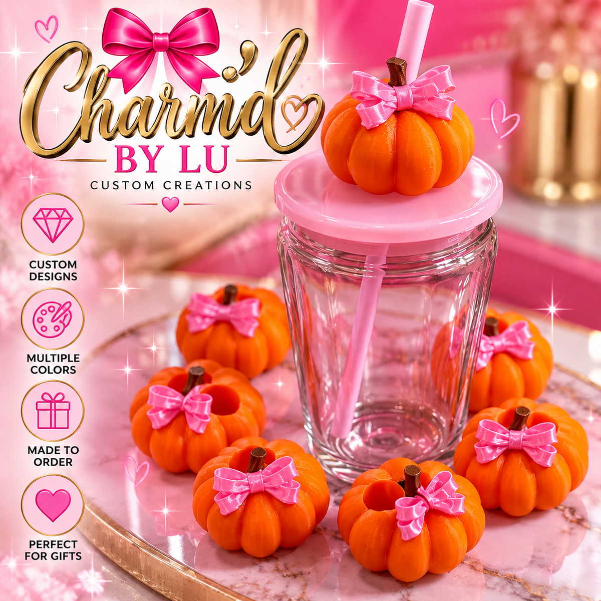 Orange pumpkin straw toppers with pink bows by Charm’d by Lu
