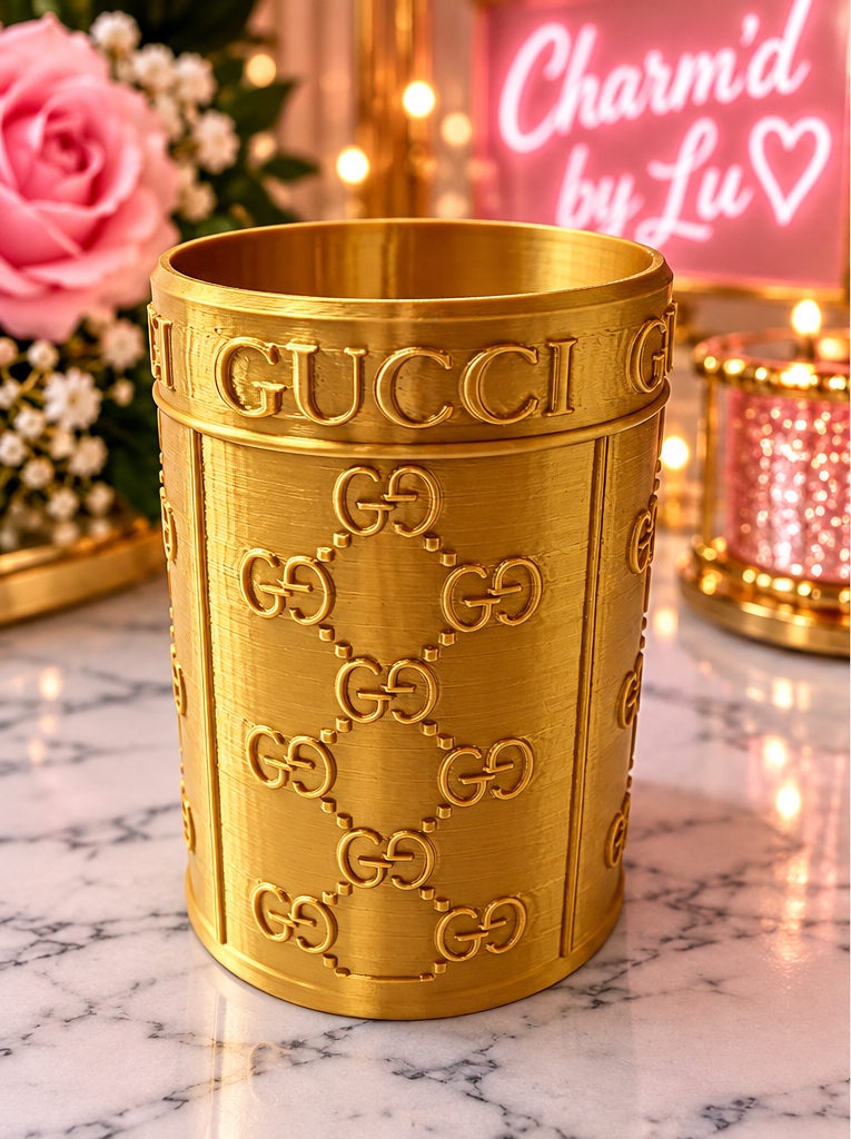 Gold 3D printed can koozie with embossed pattern